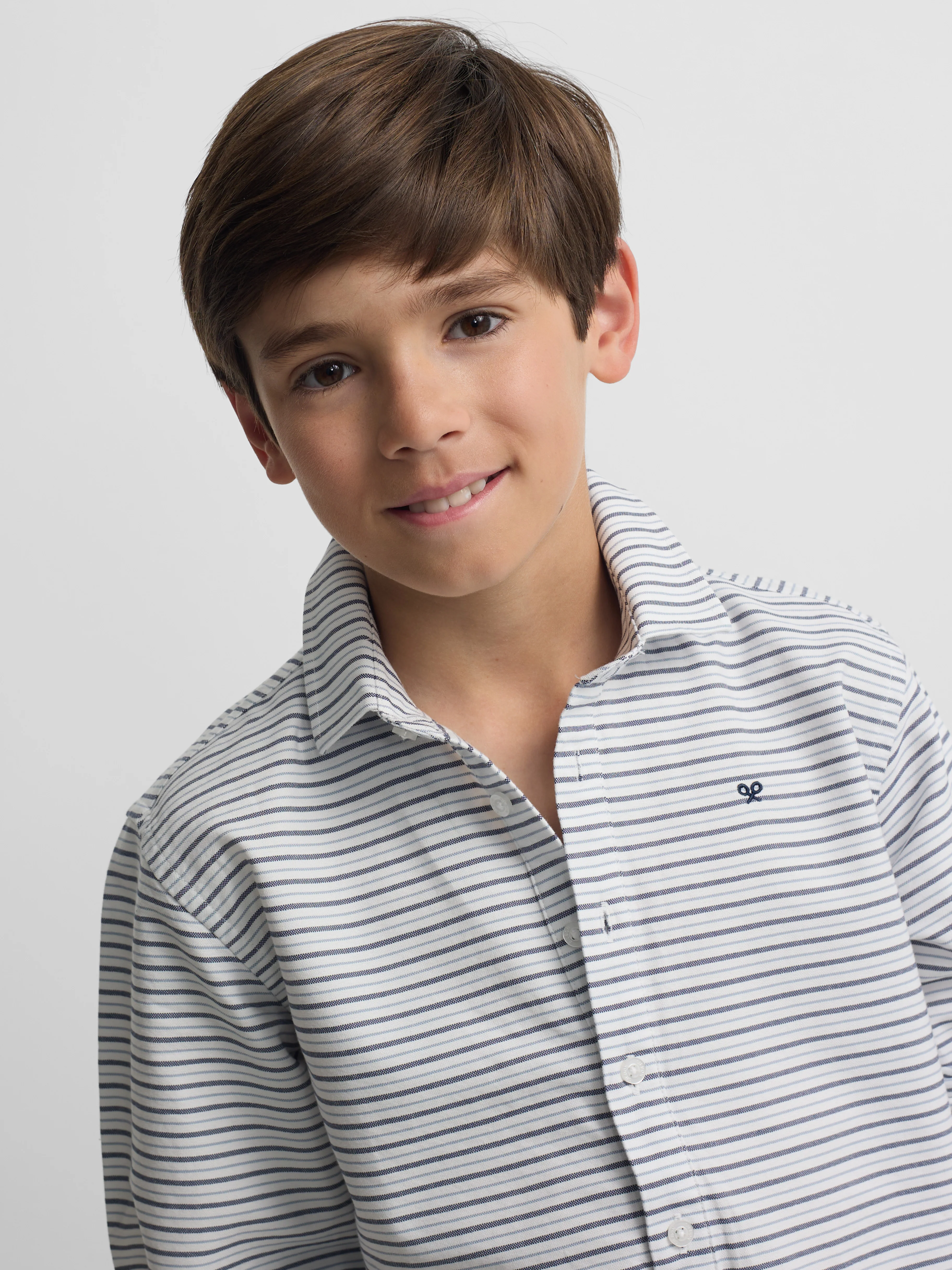 Polera sport kids oxford raya crema azul marino - Image 3