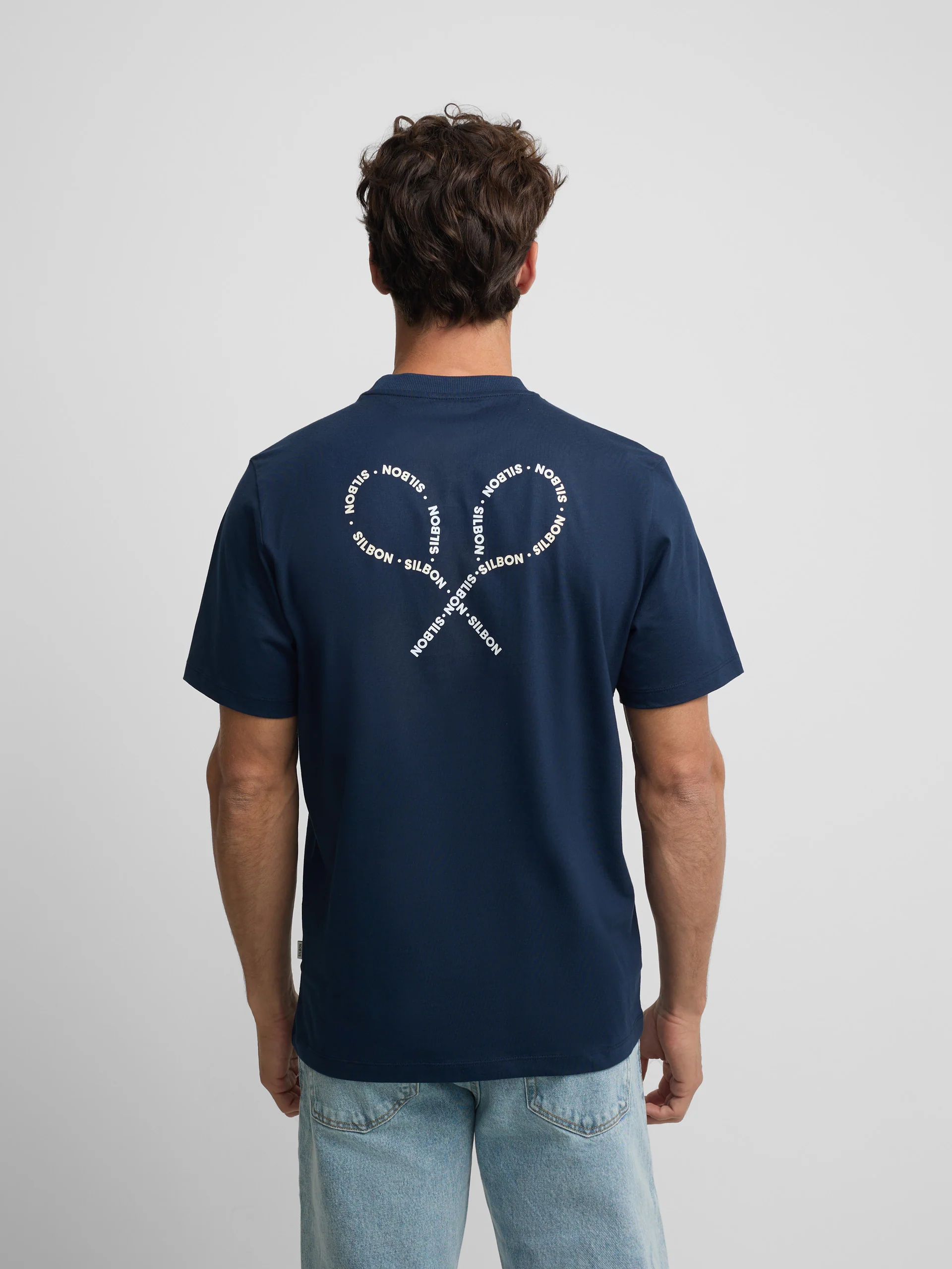 Camiseta raquetas lettering azul marino